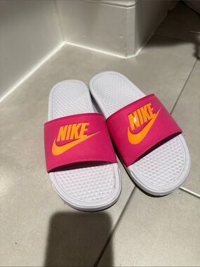 Nike Women’s Hot Pink Slides with Orange Swoosh